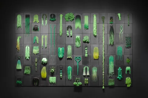 Tiff Massey, (American, b. 1981). I’ve Got Bundles and I Got Flewed Out (Green), 2023. Canvas, Kanekelon, beads. Collection of the artist.